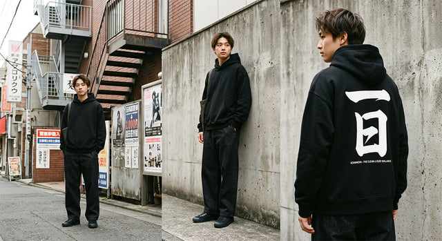 Three-panel lookbook showing a man in an oversized black hoodie with a bold white kanji back graphic in a Tokyo alley.
