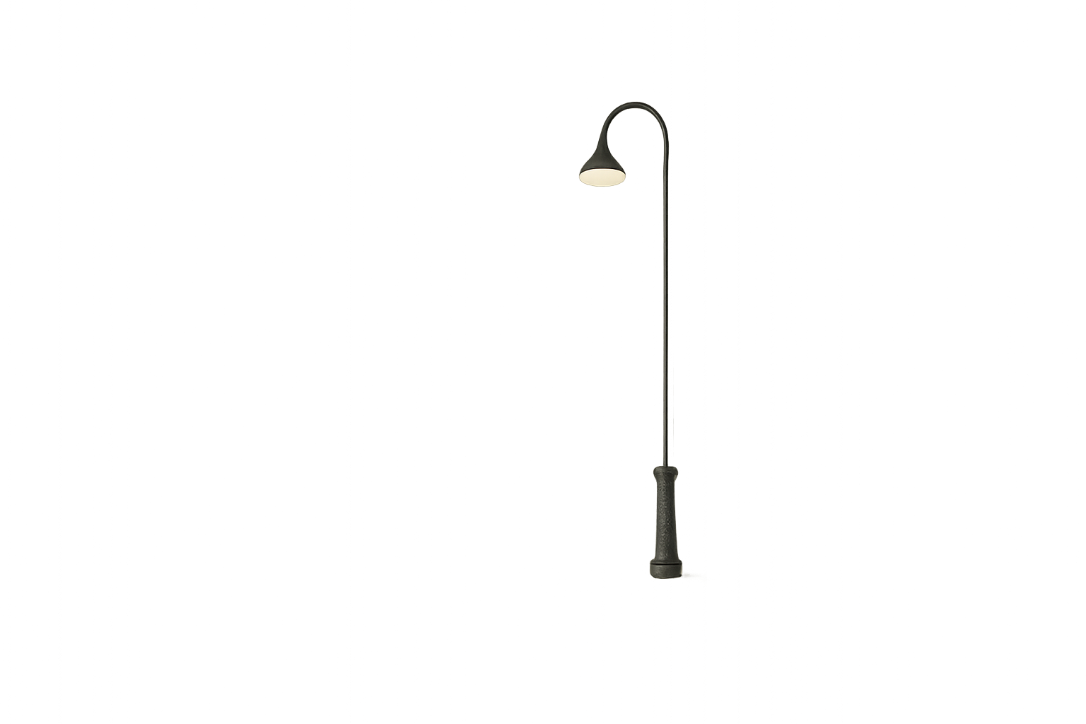 Minimalist empty street with single glowing streetlight at night.