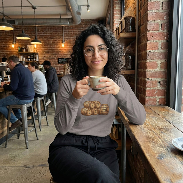 Woman holding a mug in a cozy cafe setting