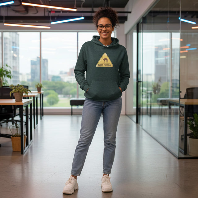 Person wearing a green hoodie with a logo in an office setting