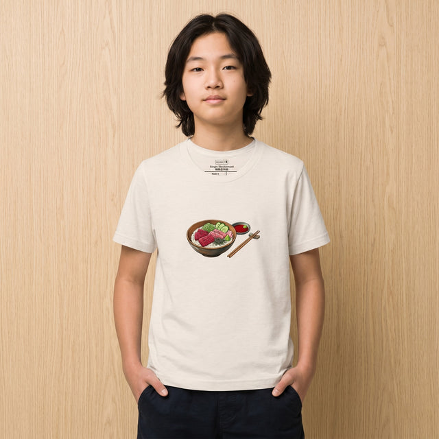 Person wearing a white t-shirt with a graphic design on a wooden background
