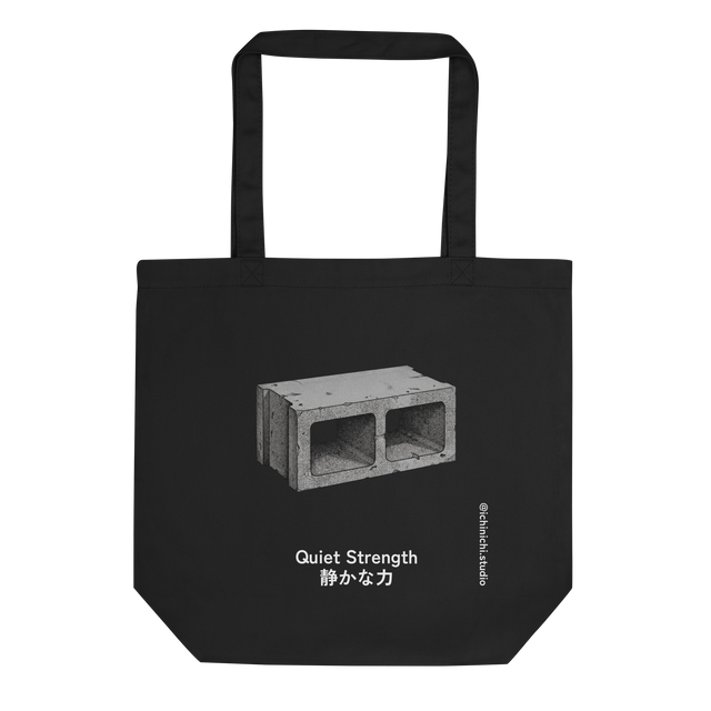Stippled concrete cinder block graphic on eco tote bag front.