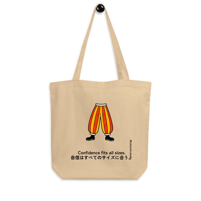 Minimalist Eco Tote Bag design featuring oversized, striped clown pants as a symbol of playfulness and confidence.