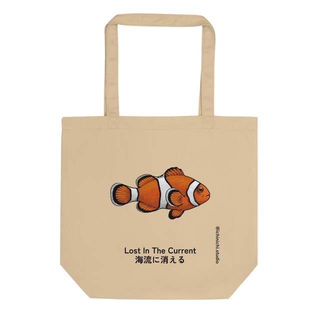 A minimalist canvas eco tote bag featuring a vibrant orange and white clown fish rendered in a bold stippling dot pattern.