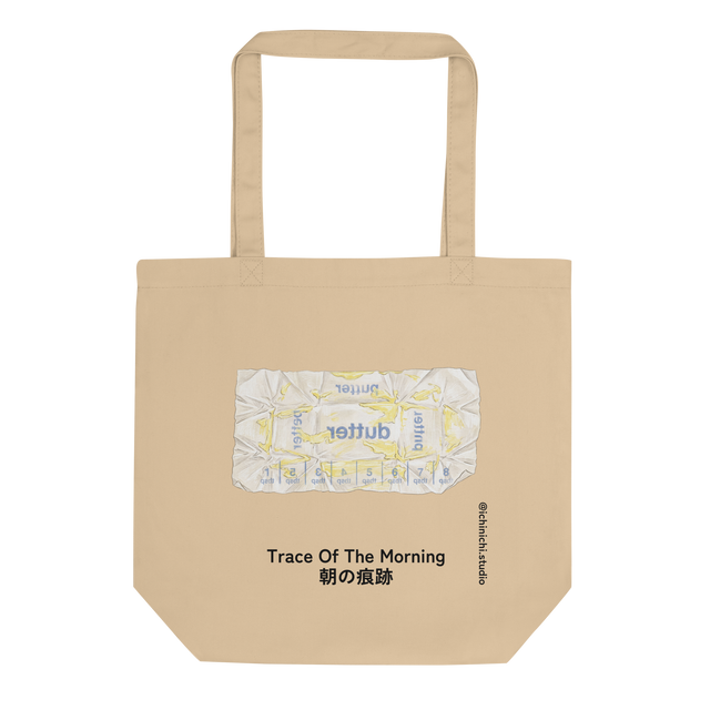 Eco Tote Bag displaying a hand-drawn colored pencil design of a flattened butter wrapper with pale yellow grease marks and reversed text.