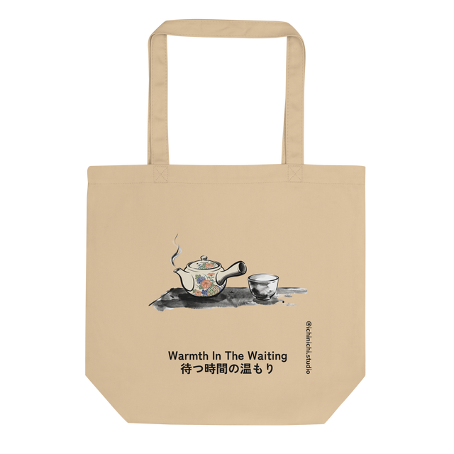 Eco Tote Bag with a light cream Japanese teapot adorned in colorful flowers next to an empty porcelain cup, illustrated in black ink wash.