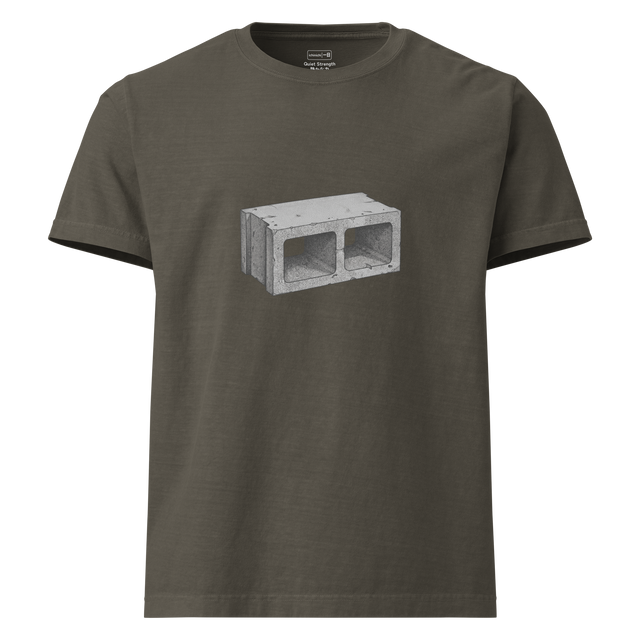 Stippled concrete cinder block graphic on oversize t-shirt front.
