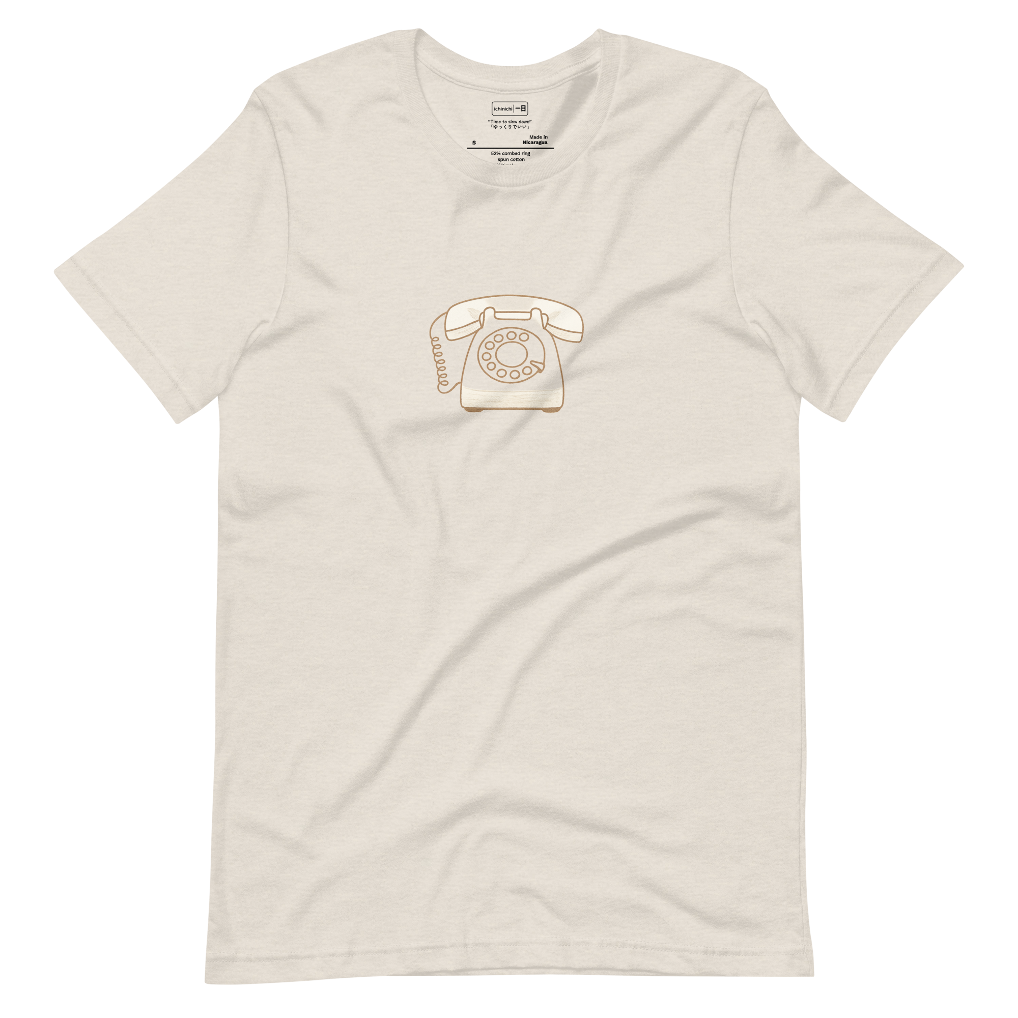 Hand-drawn rotary phone with minimalist vintage style on a neutral t-shirt.