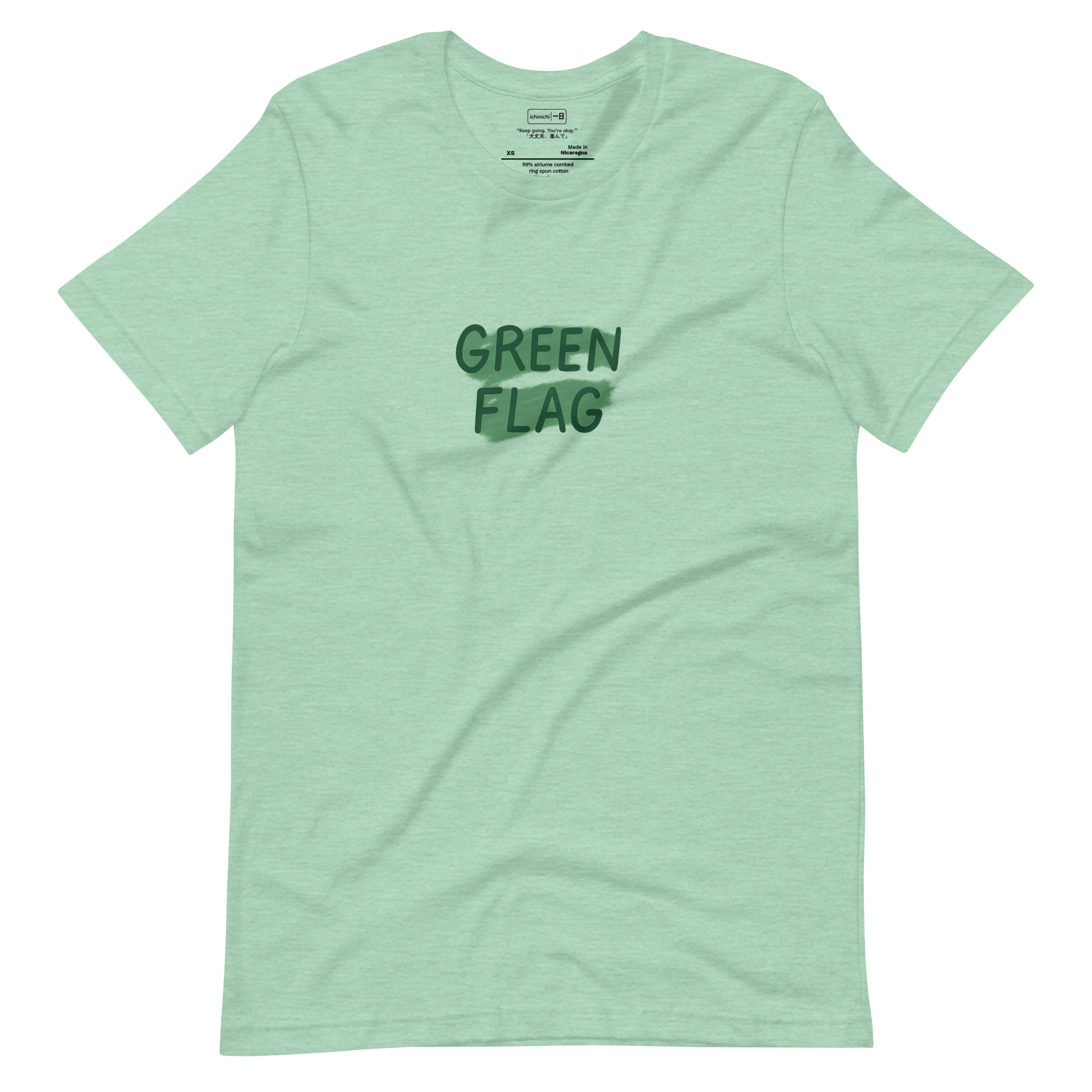 Minimalist t-shirt with “Green Flag” text and abstract green brushstrokes