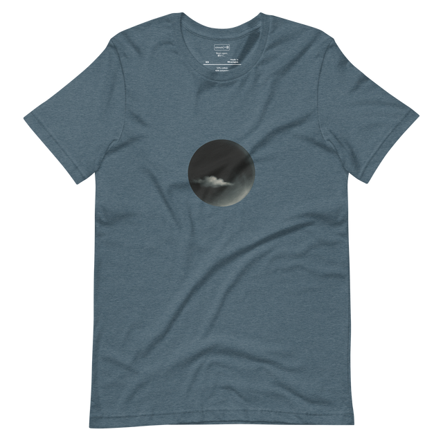 A minimalist graphic of a black moon centered on a heather black shirt