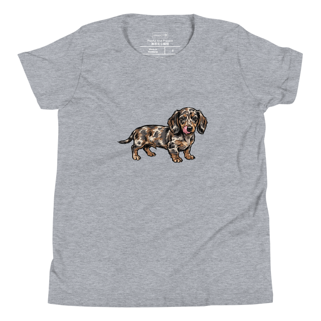 Youth T-Shirt featuring a brush pen illustration of a dapple Dachshund puppy with its tongue out.