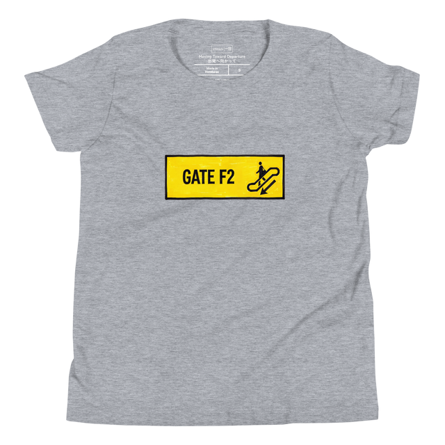 Youth T-Shirt with a yellow marker drawing of a GATE F2 transit sign, a person with a bag on an escalator, and a downward arrow.