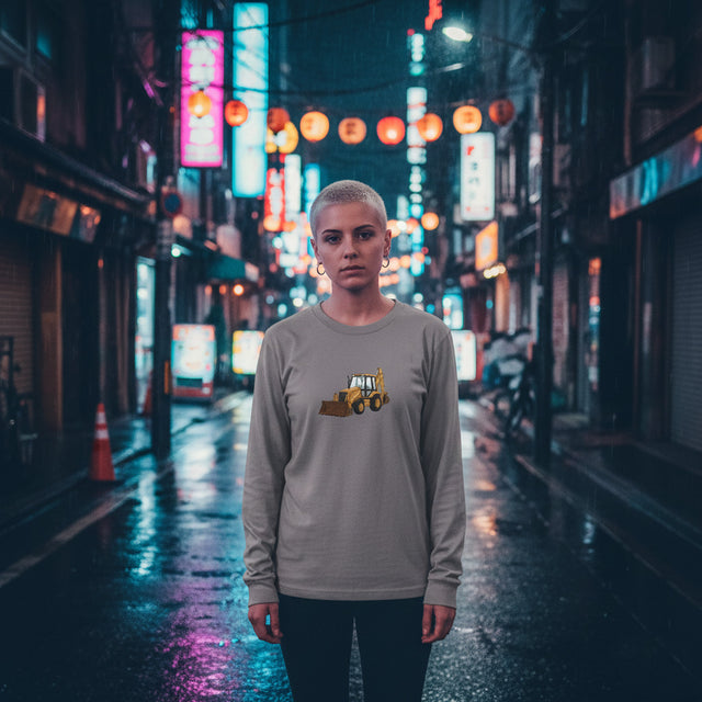 Person standing on a neon-lit street at night