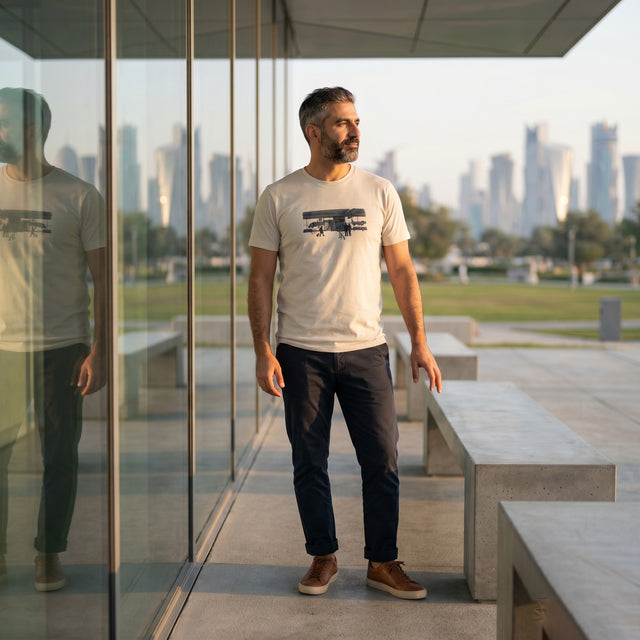 Man standing in a modern outdoor setting with a cityscape in the background