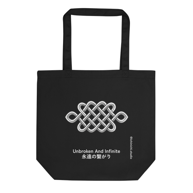 Graphite pencil drawing of an eternal knot on a minimalist eco tote bag.