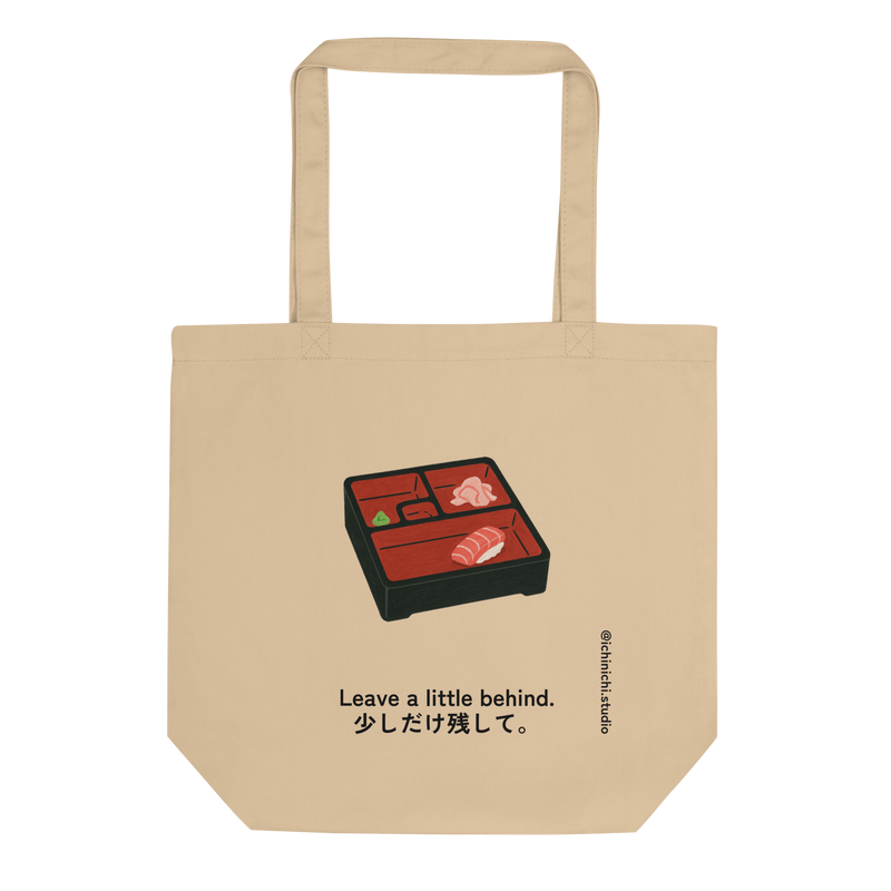 Minimalist Eco Tote Bag design showing a bento box with one last piece of sushi, expressing calm and mindful simplicity.
