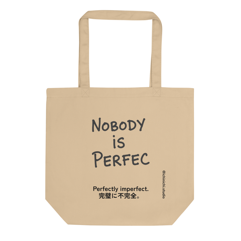 Minimalist Eco Tote Bag design with the phrase “Nobody Is Perfec” in simple typography, embracing humor and imperfection.
