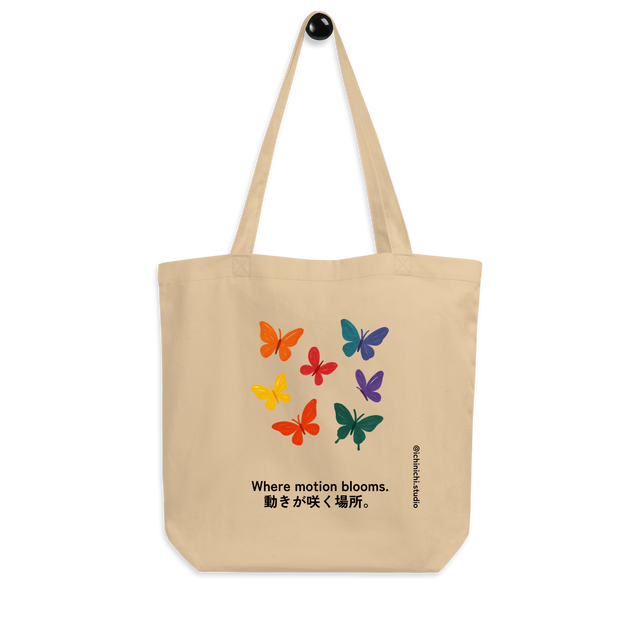 Minimalist Eco Tote Bag design with several butterflies drifting in various directions to form an abstract garden of movement.
