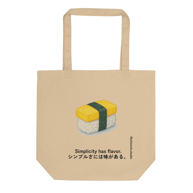 Minimalist Eco Tote Bag design featuring a single tamago sushi wrapped with dark green nori.
