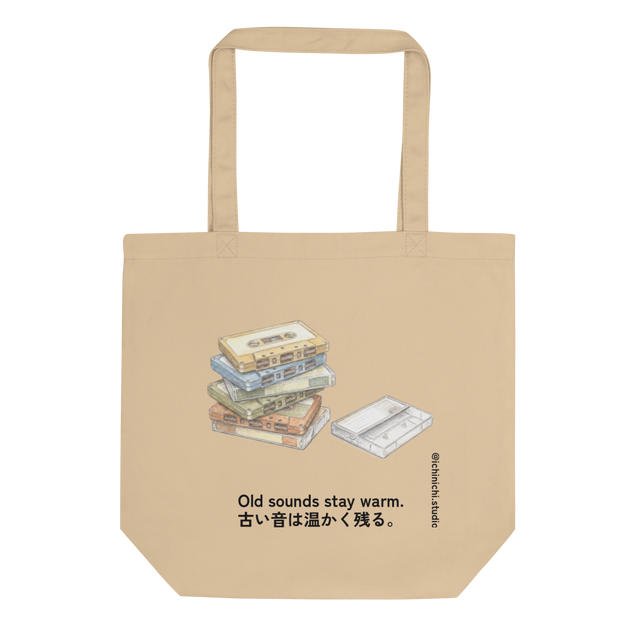 Minimal illustration of a stack of cassette tapes on an eco tote bag design.
