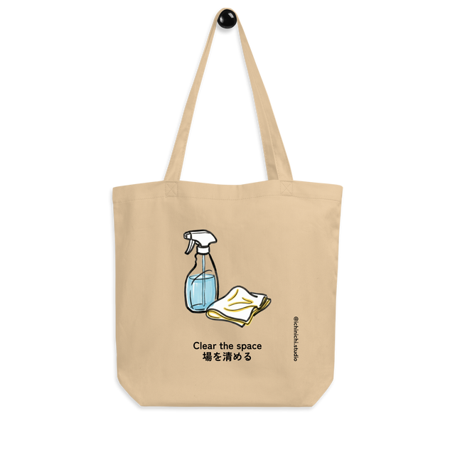 Minimalist Eco Tote Bag graphic featuring a spray bottle and a crumpled rag.