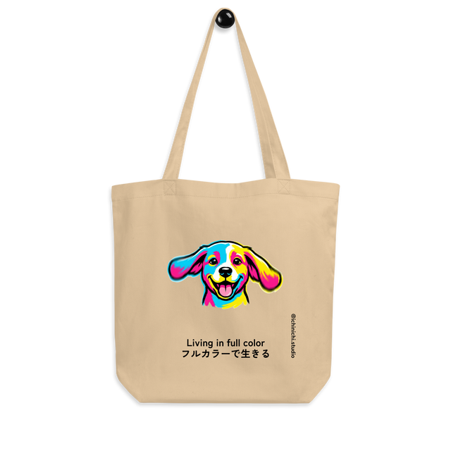 Graphic Pop Art style Tote Bag featuring a silly happy puppy face in bold colors.