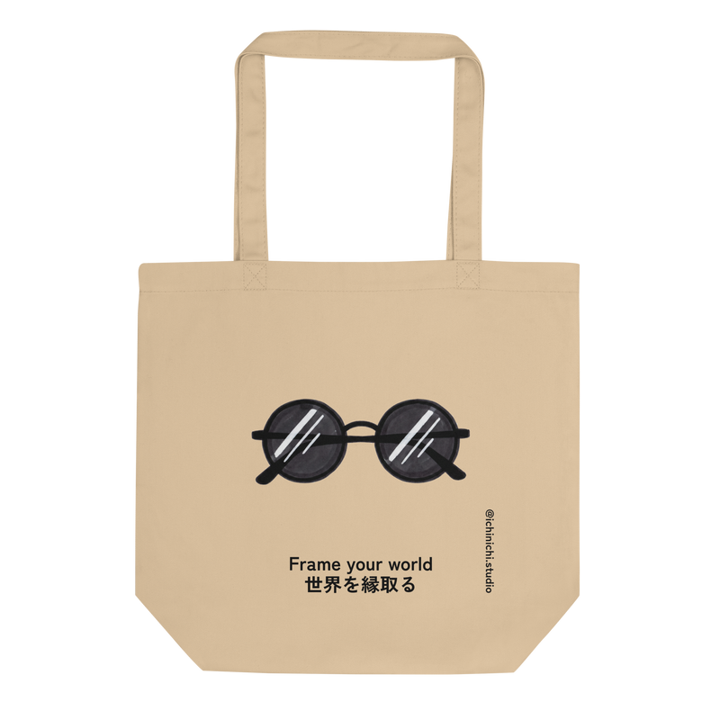 Minimalist pop-art line drawing of round wire-frame sunglasses on a canvas Tote Bag.