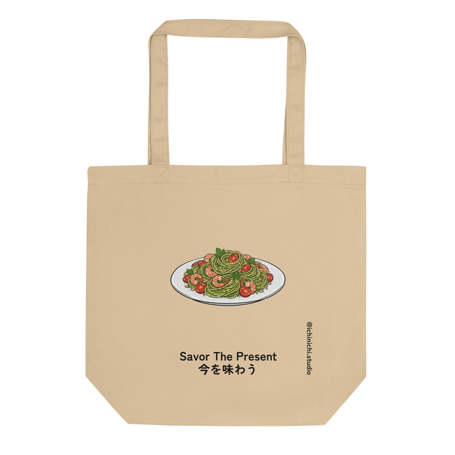 A natural canvas Eco Tote Bag featuring a clean paint brush illustration of vibrant pesto linguini with shrimp on a crisp plate.
