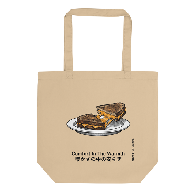 Eco Tote Bag featuring a cross-hatch ink illustration of a diagonally cut grilled cheese sandwich with stretching cheddar.