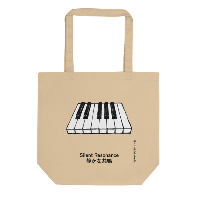 A high-contrast marker illustration of multiple black and white piano keys floating on a natural canvas eco tote bag.