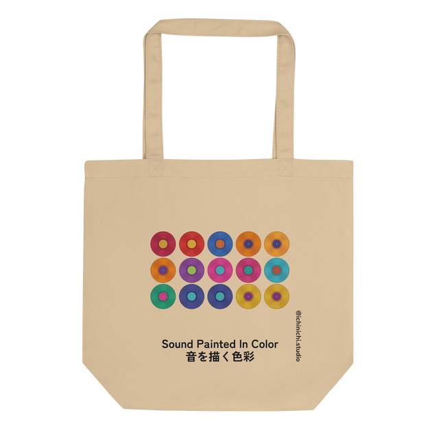 Fifteen colorful vinyl records with contrasting center labels in a 5x3 grid painted with brush strokes on an Eco Tote Bag.