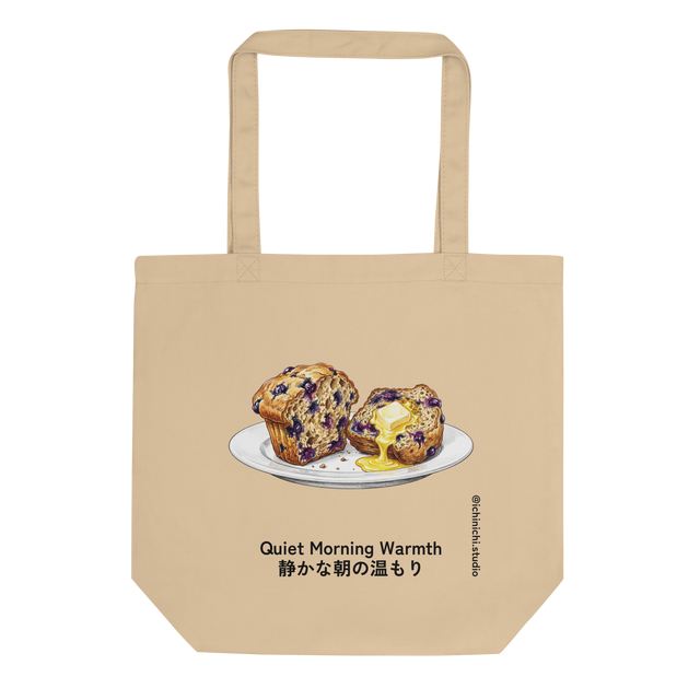 Eco Tote Bag displaying a hand-drawn colored pencil illustration of a halved blueberry muffin with melting butter.