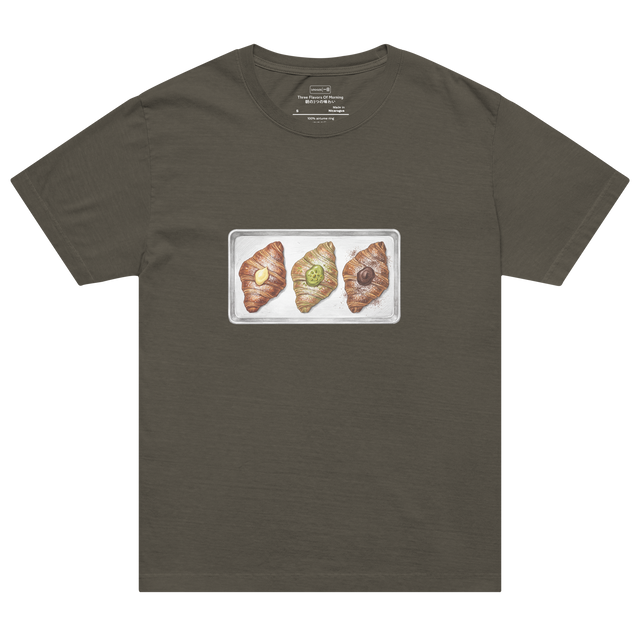 Hand-drawn color pencil illustration of three filled croissants with varied fillings on a metal tray printed on an Oversized T-Shirt.
