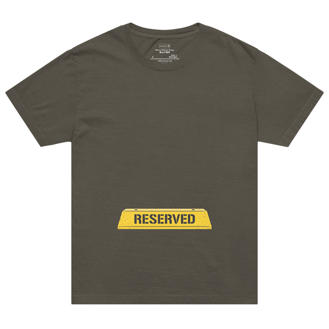 A graphic yellow concrete parking block with black "RESERVED" stencil text printed on an Oversized T-Shirt.