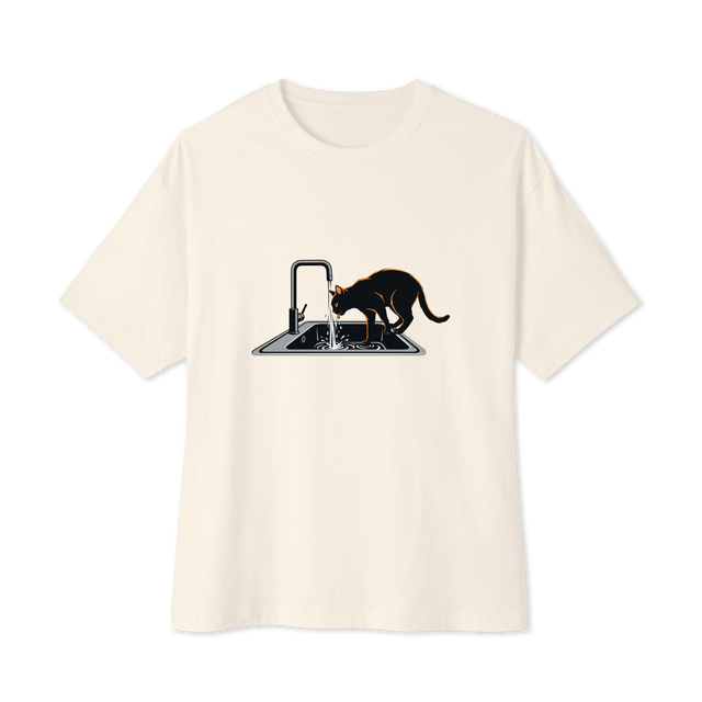 Graphic brush illustration of a cat silhouette drinking from a running sink with slight orange highlights on an Oversized T-Shirt.