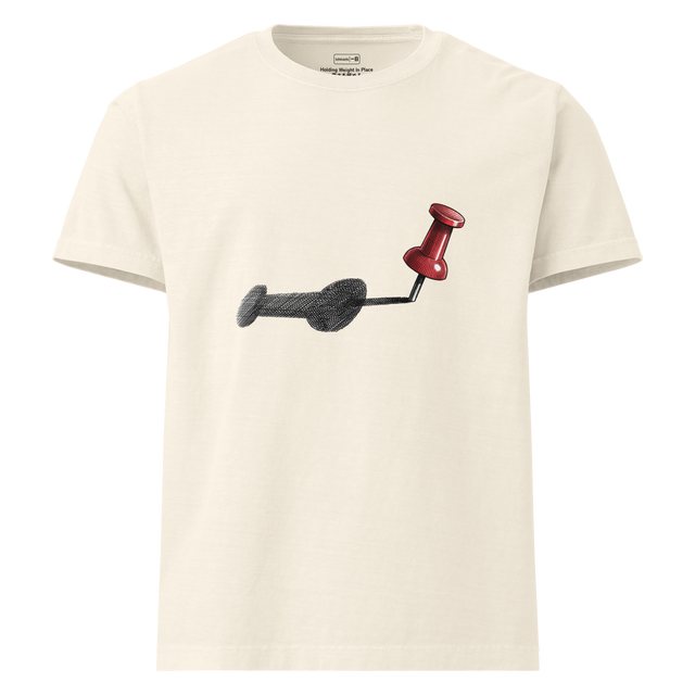 Descriptive graphic of a red thumbtack casting a long shadow in cross-hatch ink on an Oversize T-Shirt.