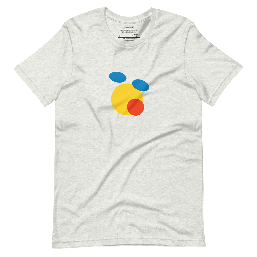 Abstract design of deconstructed emoji face using bold circles and ovals in bright colors
