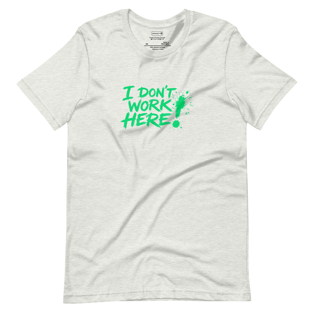 Bright green messy handwritten text reading I Don't Work Here with a paint splatter exclamation point on a Short Sleeve T-Shirt.