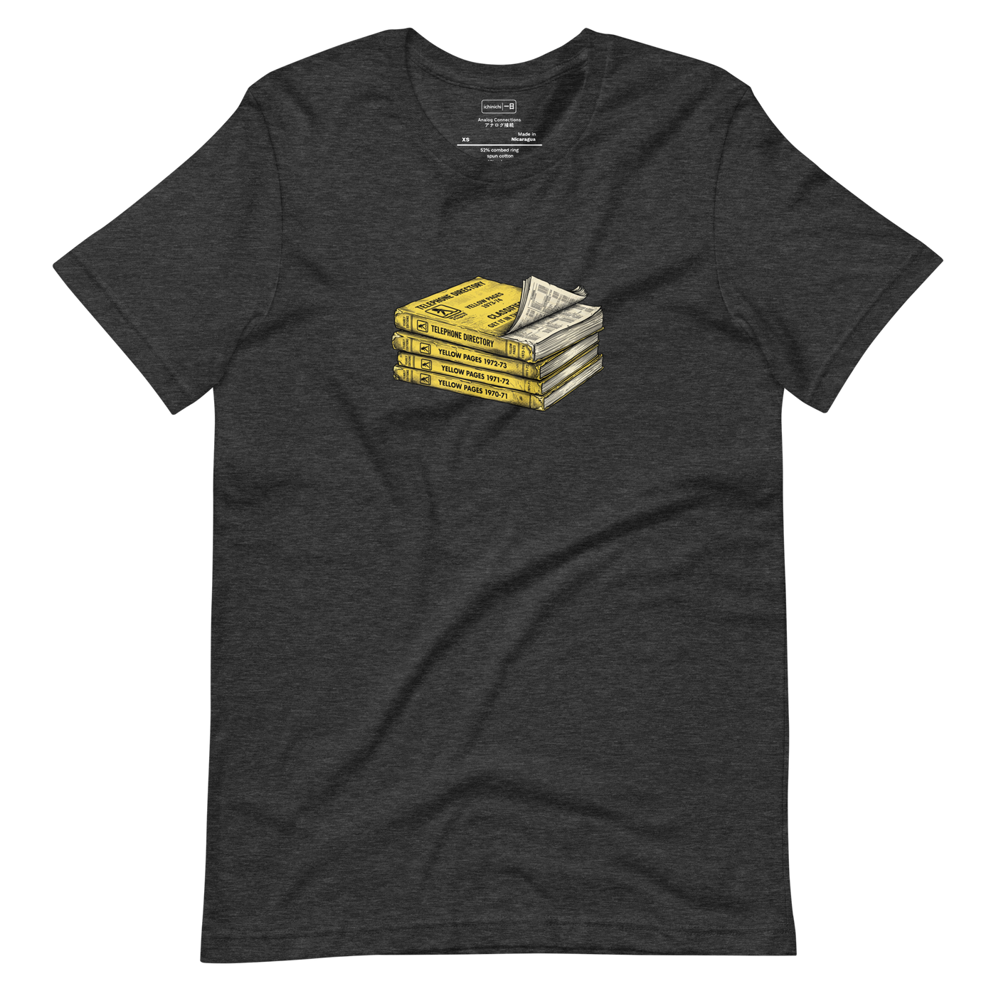 Cross-hatch ink illustration of a stack of vintage yellow pages on a Short Sleeve T-Shirt.
