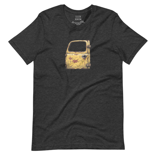 Cross-hatch ink drawing of an old yellow truck door with rust and a missing handle on a unisex short sleeve t-shirt.