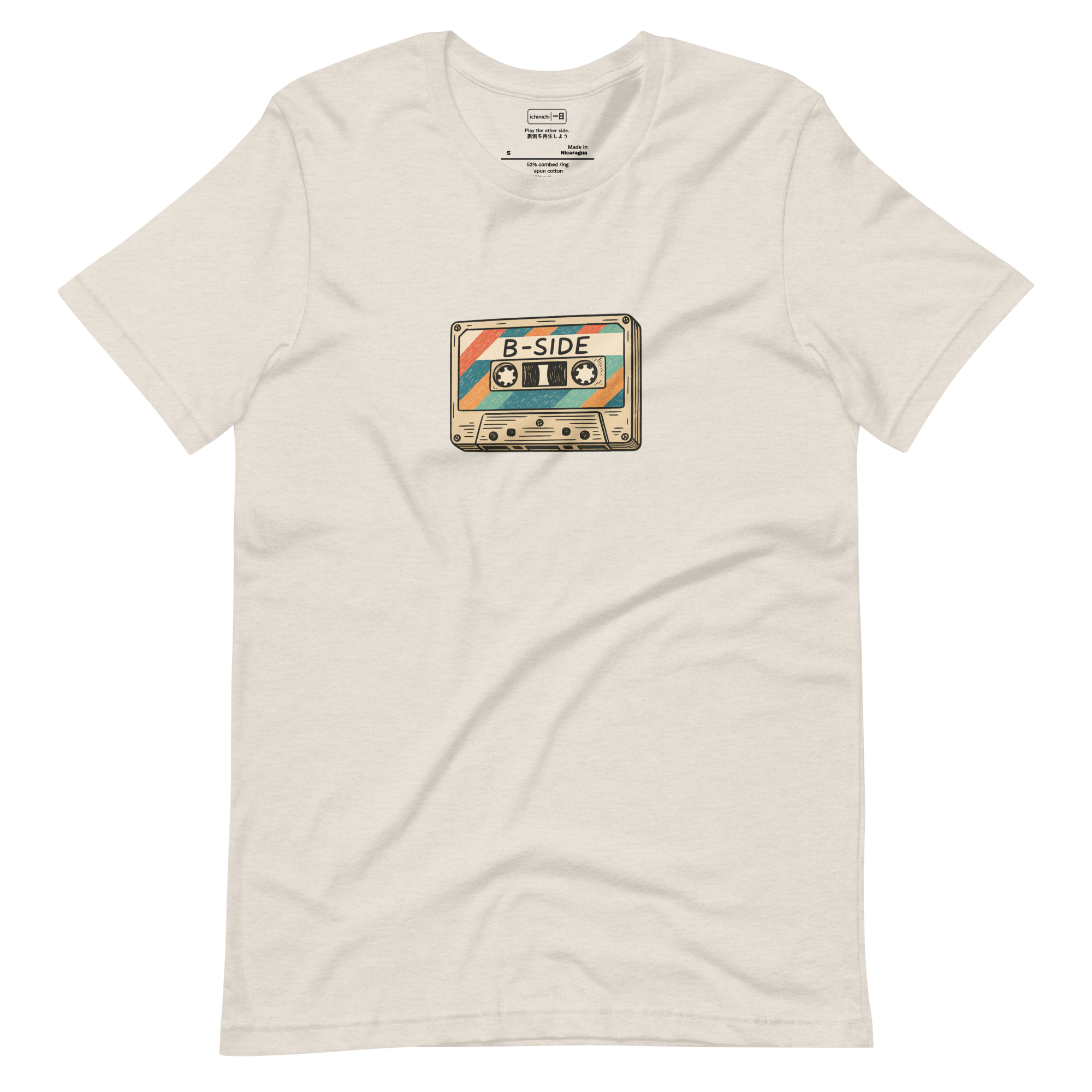 Hand-drawn vintage cassette tape labeled B-Side on a light t-shirt
