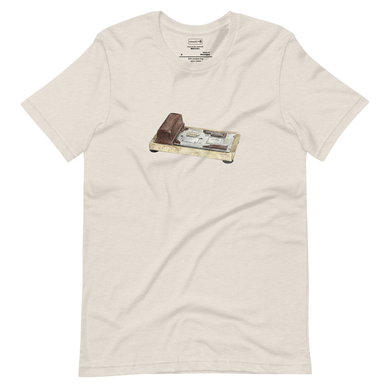 Minimalist T-Shirt design featuring a vintage manual credit card imprinter machine line art.