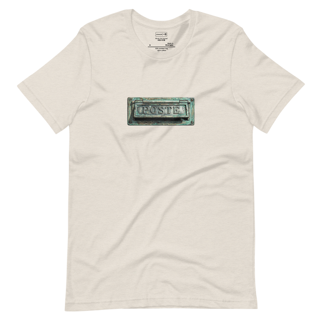 Vintage bronze POSTE mail slot with stippling effect on short sleeve t-shirt.