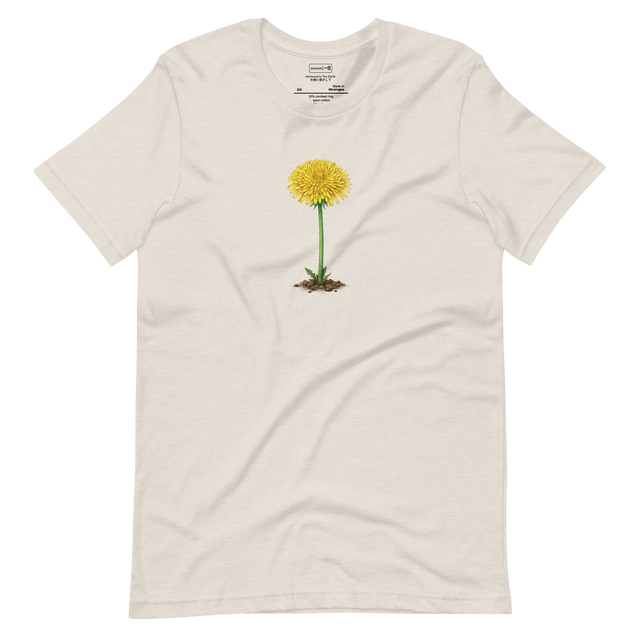 Full-color stippled illustration of a blooming dandelion with its stem anchored in dirt on a Short Sleeve T-Shirt.