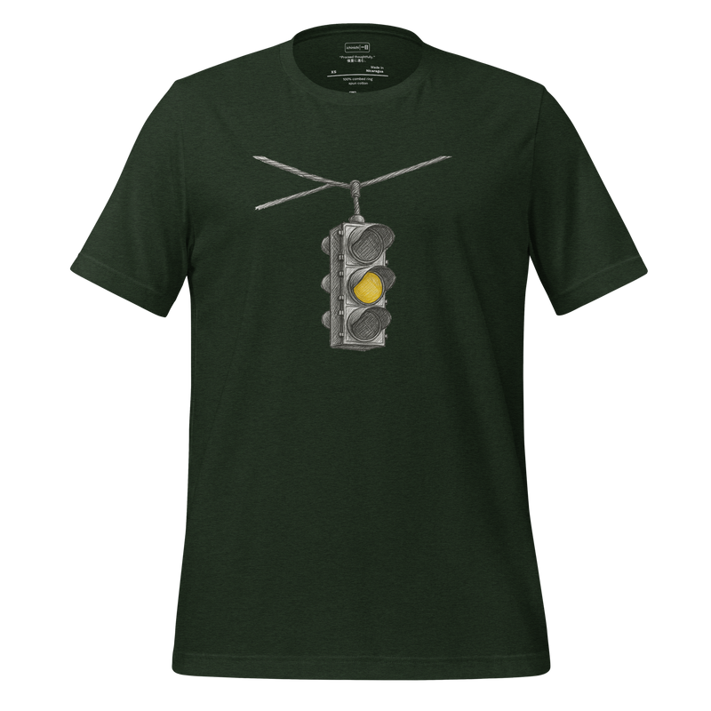 Minimalist T-Shirt design featuring a single flashing yellow street light suspended at an empty intersection at night.
