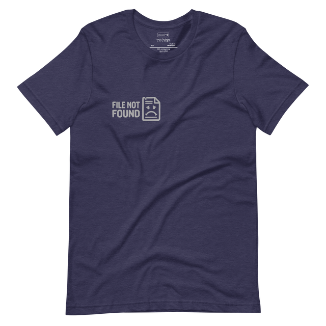 A minimalist light grey line drawing of a frowning computer document and MS-DOS text printed on a Short Sleeve T-Shirt.