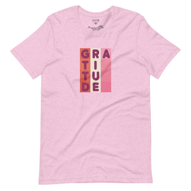 Soft 3D pillowed letters spelling gratitude arranged in a geometric color block grid on a Unisex Short Sleeve T-Shirt.