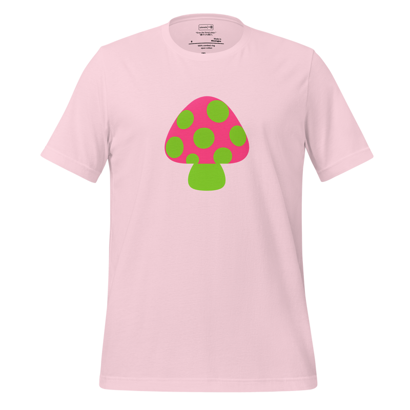 Bold geometric mushroom illustration with pink cap and green polka dots