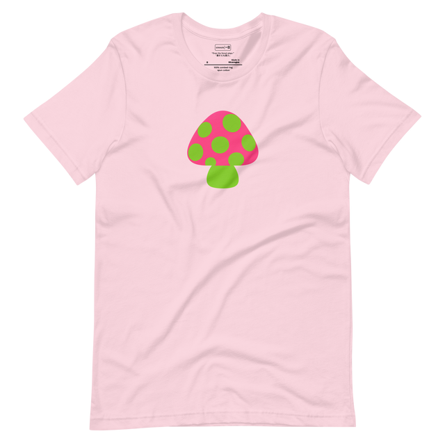 Bold geometric mushroom illustration with pink cap and green polka dots
