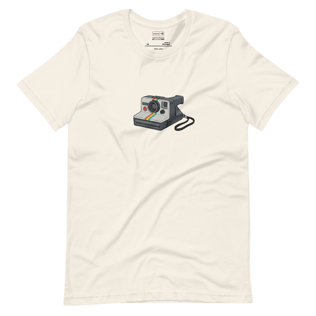 Marker illustration of a 1970s instant camera with a rainbow stripe and flash, centered on a Short Sleeve T-Shirt.